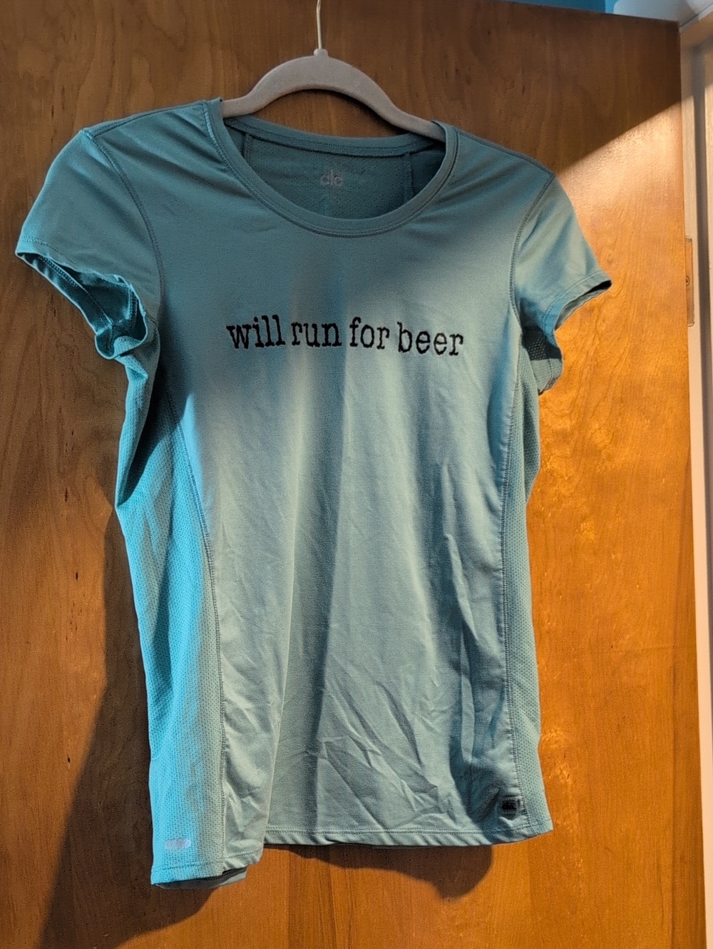 ALO Yoga Short Sleeve Tee in Light Teal with 'will run for beer' Graphic
